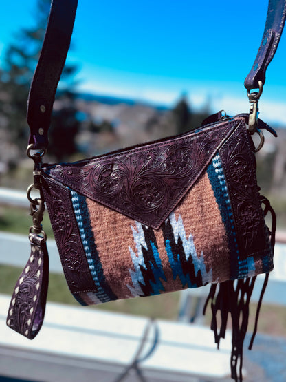 Saddle blanket bag with tooled leather 
